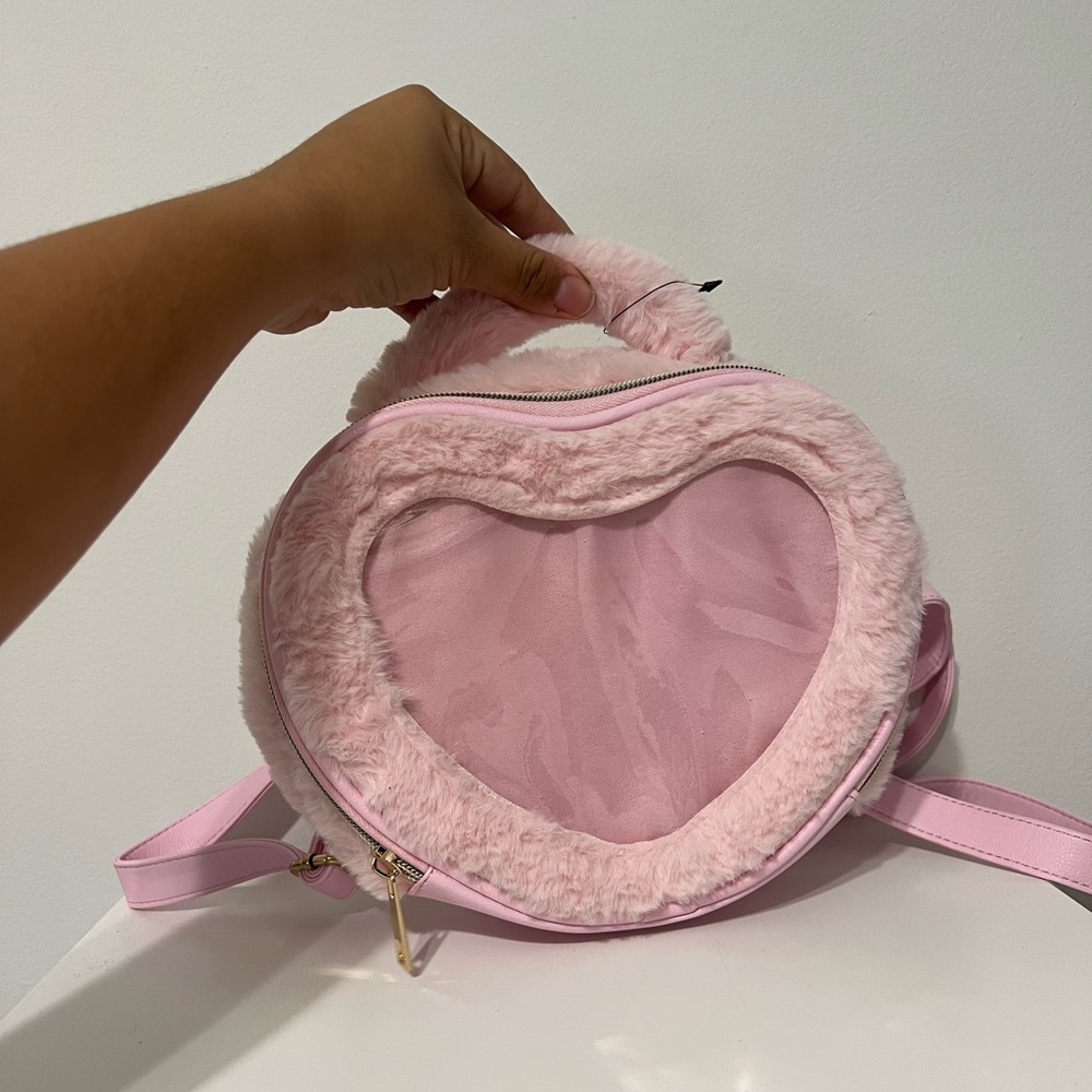 Pin heart book bag